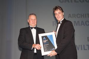  (L-R) Blake Bibbie from Placemakers with ABL Quantity Surveyor Brett Squire accepting the company's award for their work on Rippon Hall.
